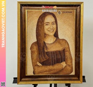 Tranh gạo chân dung doanh nhân trẻ