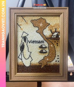 Tranh gạo cô gái áo dài và bản đồ Việt Nam đóng khung vàng