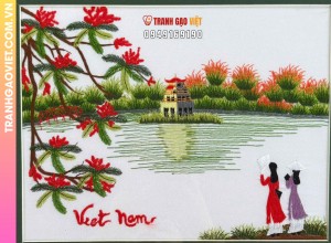 Tranh thêu tay Tháp Rùa Hồ Gươm và thiếu nữ áo dài bên hoa phượng